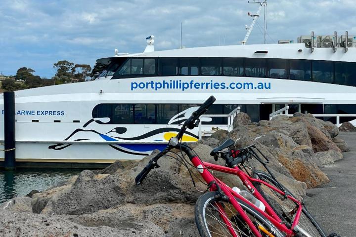 a bicycle parked on a beach